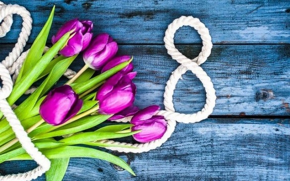 What flowers are given to a girl, wife, or mother on March 8?